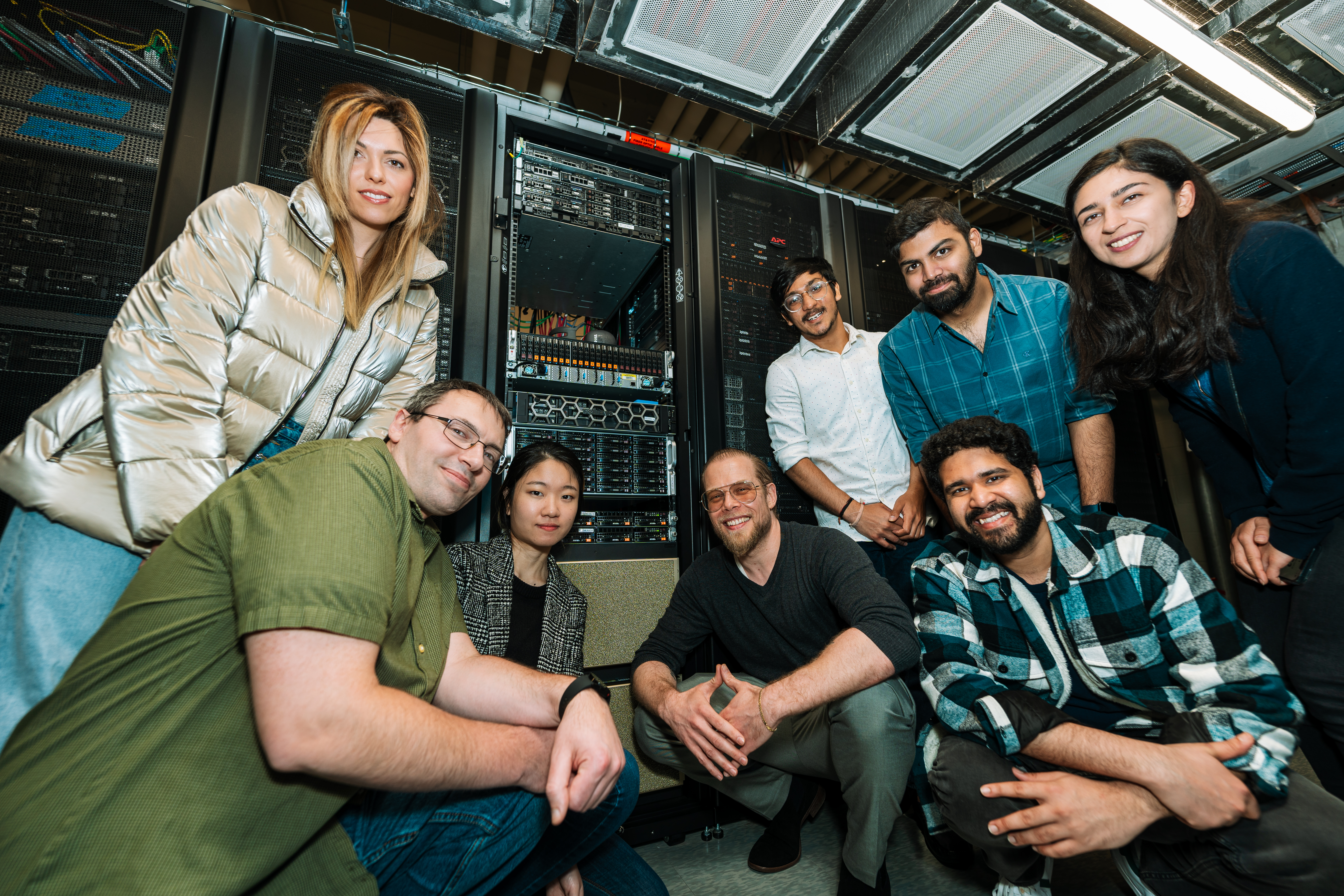 UMB MPSYCH Team posing with NVIDIA A100 Cluster